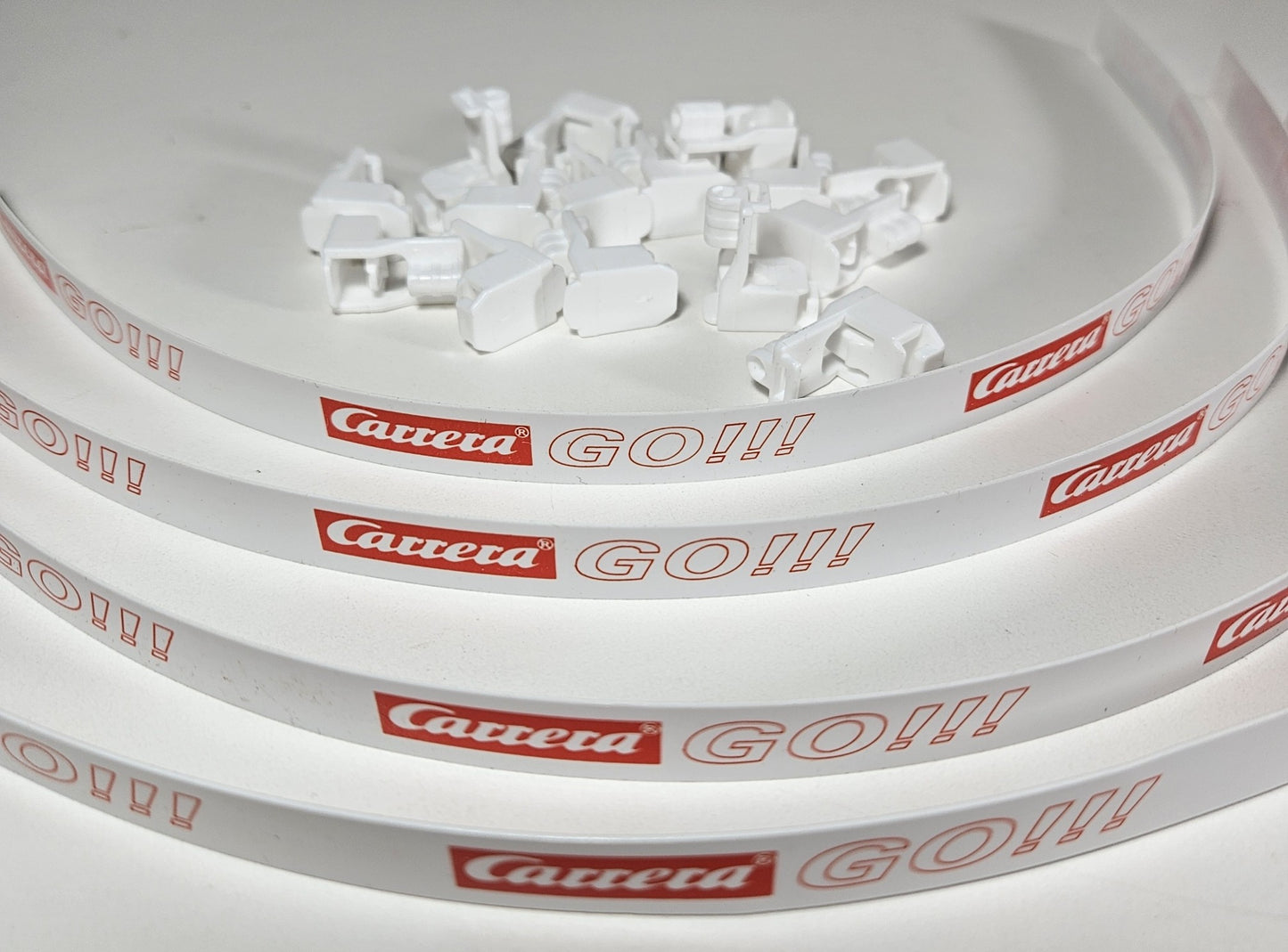 Carrera GO!!! (PRE-OWNED) 4 Guardrails with 16 supports for use with Carrera GO!!! 1/43 Scale Slot Car Tracks