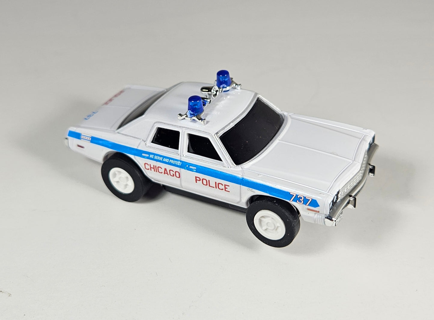 Auto World AMP Xtraction 1975 Dodge Monaco Chicago 737 Police HO Scale Slot Car