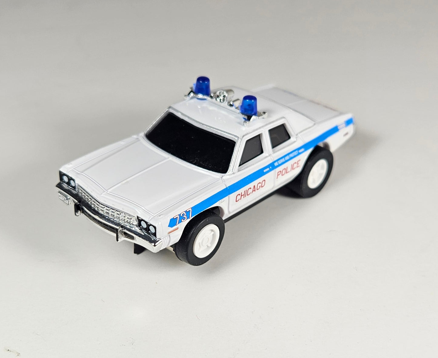 Auto World AMP Xtraction 1975 Dodge Monaco Chicago 737 Police HO Scale Slot Car
