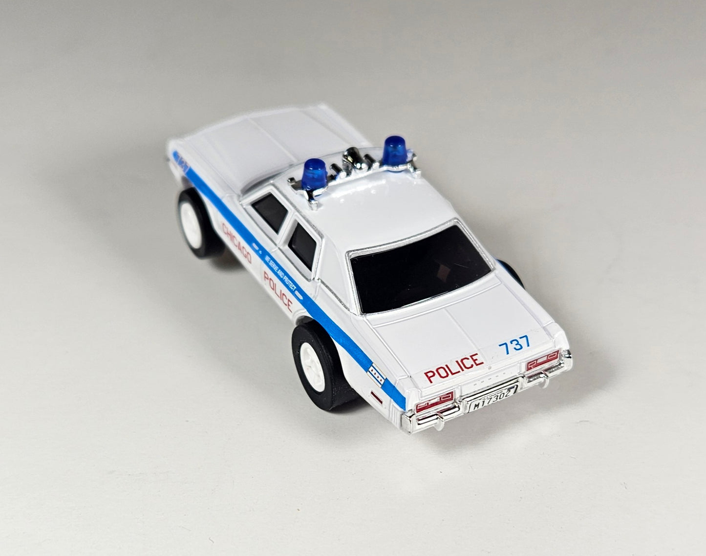 Auto World AMP Xtraction 1975 Dodge Monaco Chicago 737 Police HO Scale Slot Car