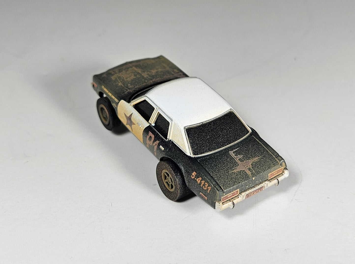 Auto World AMP Xtraction 1974 Dodge Monaco Bluesmobile HO Scale Slot Car SRS360