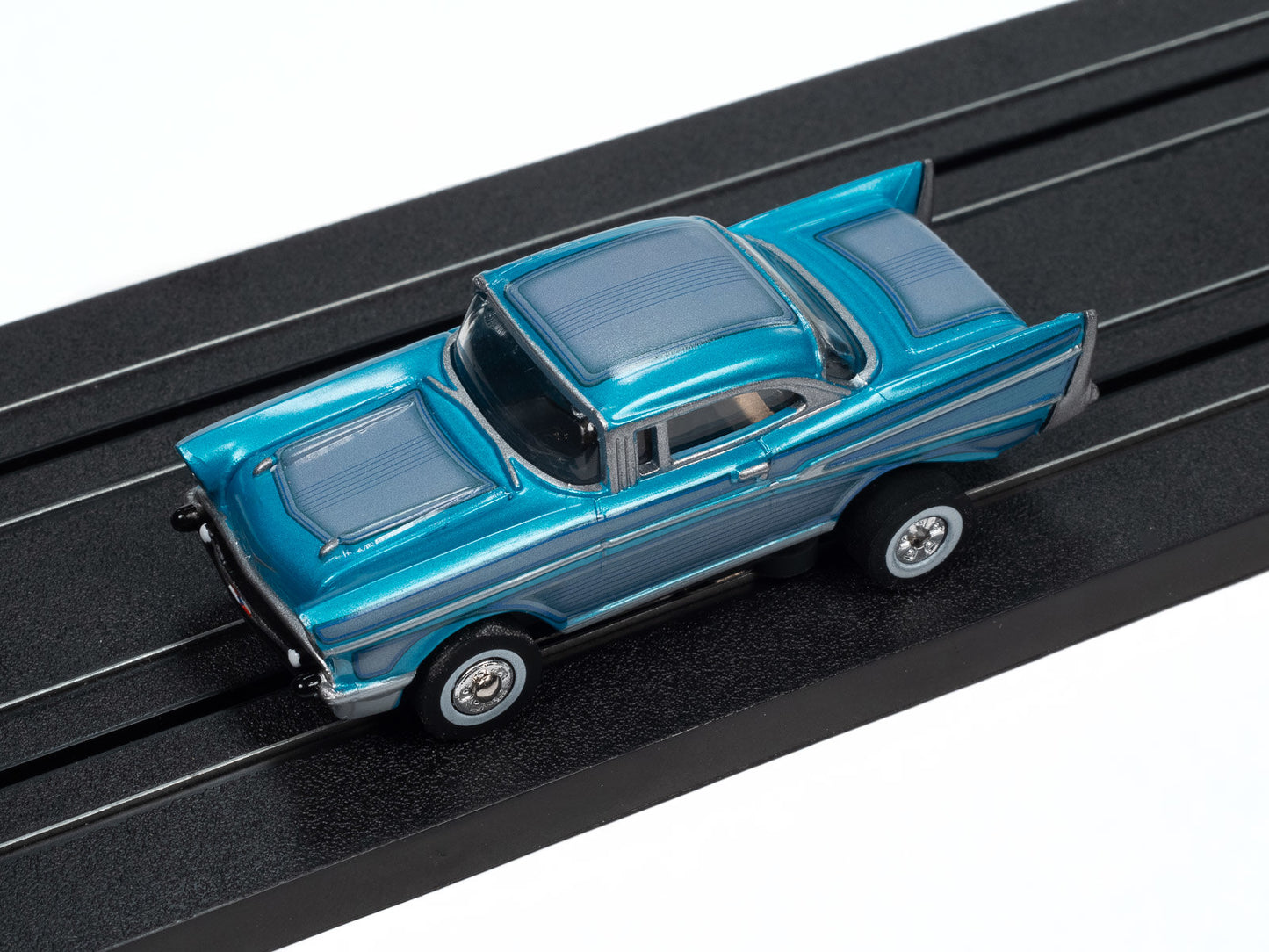 Auto World Thunderjet SC411-3B 1957 Chevrolet Bel Air Lowrider (Aqua) HO Scale Slot Car