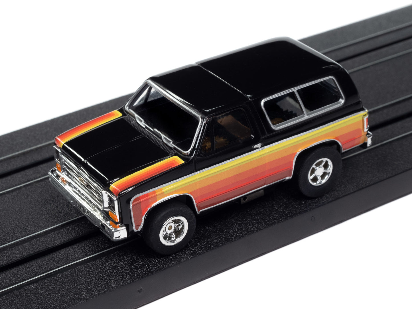 Auto World Xtraction SC407-3B 1979 Chevy Blazer Black w/ Red & Yellow Side Panels HO Scale Slot Car