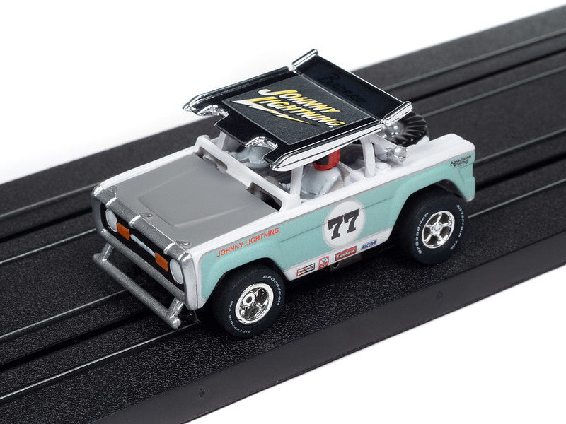 Auto World Xtraction SC407-1B 1972 Ford Baja Bronco White w/ Light Teal Race Graphics HO Scale Slot Car