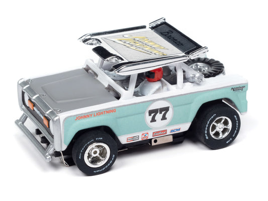 Auto World Xtraction SC407-1B 1972 Ford Baja Bronco White w/ Light Teal Race Graphics HO Scale Slot Car