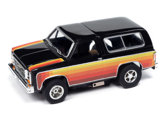 Auto World Xtraction SC407-3B 1979 Chevy Blazer Black w/ Red & Yellow Side Panels HO Scale Slot Car